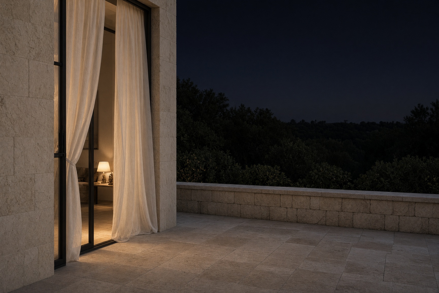 A private villa terrace at dusk — limestone, linen, one lamp.